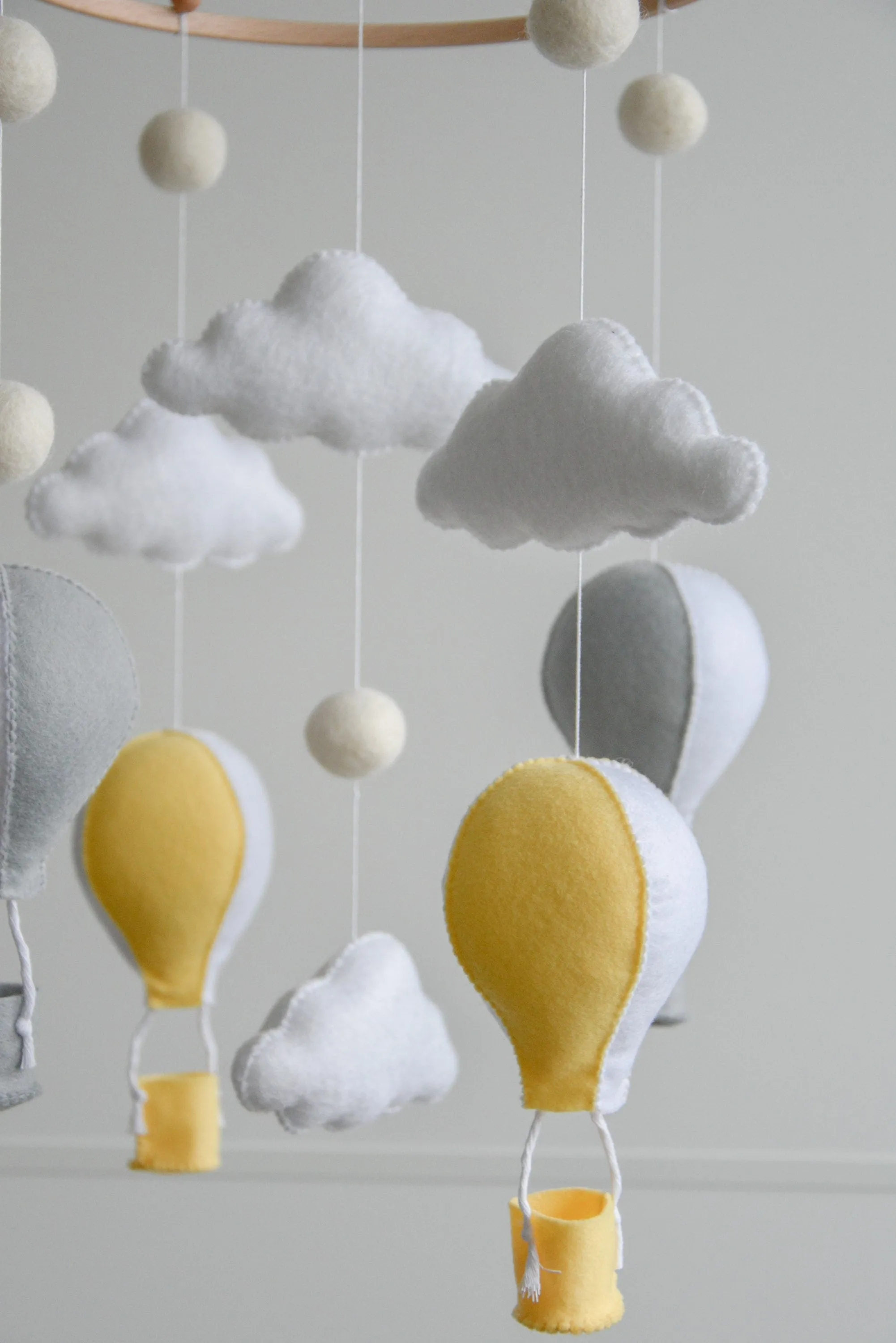 Hot air balloons mobile with felted balls and clouds