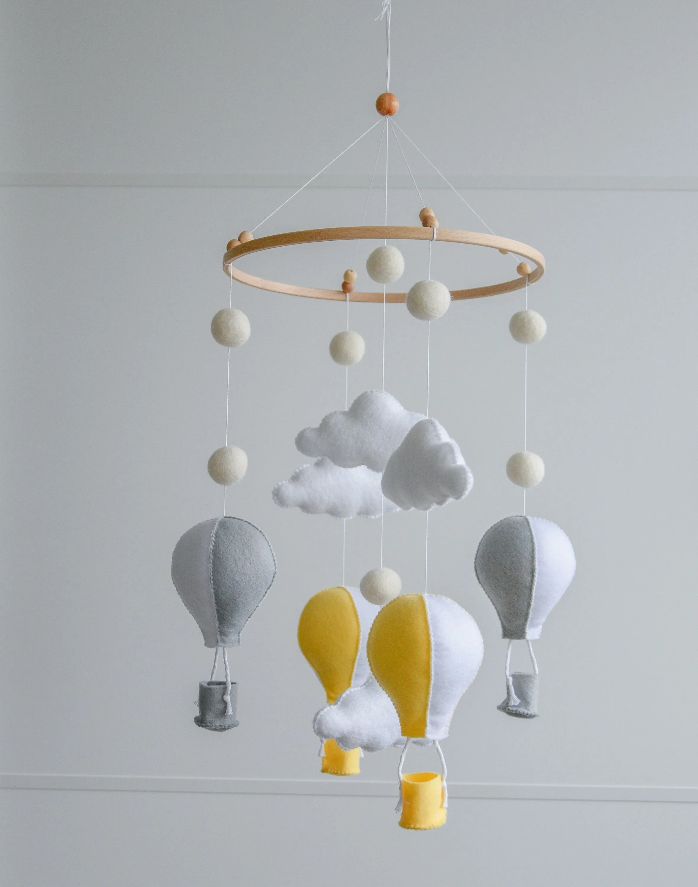 Hot air balloons mobile with felted balls and clouds