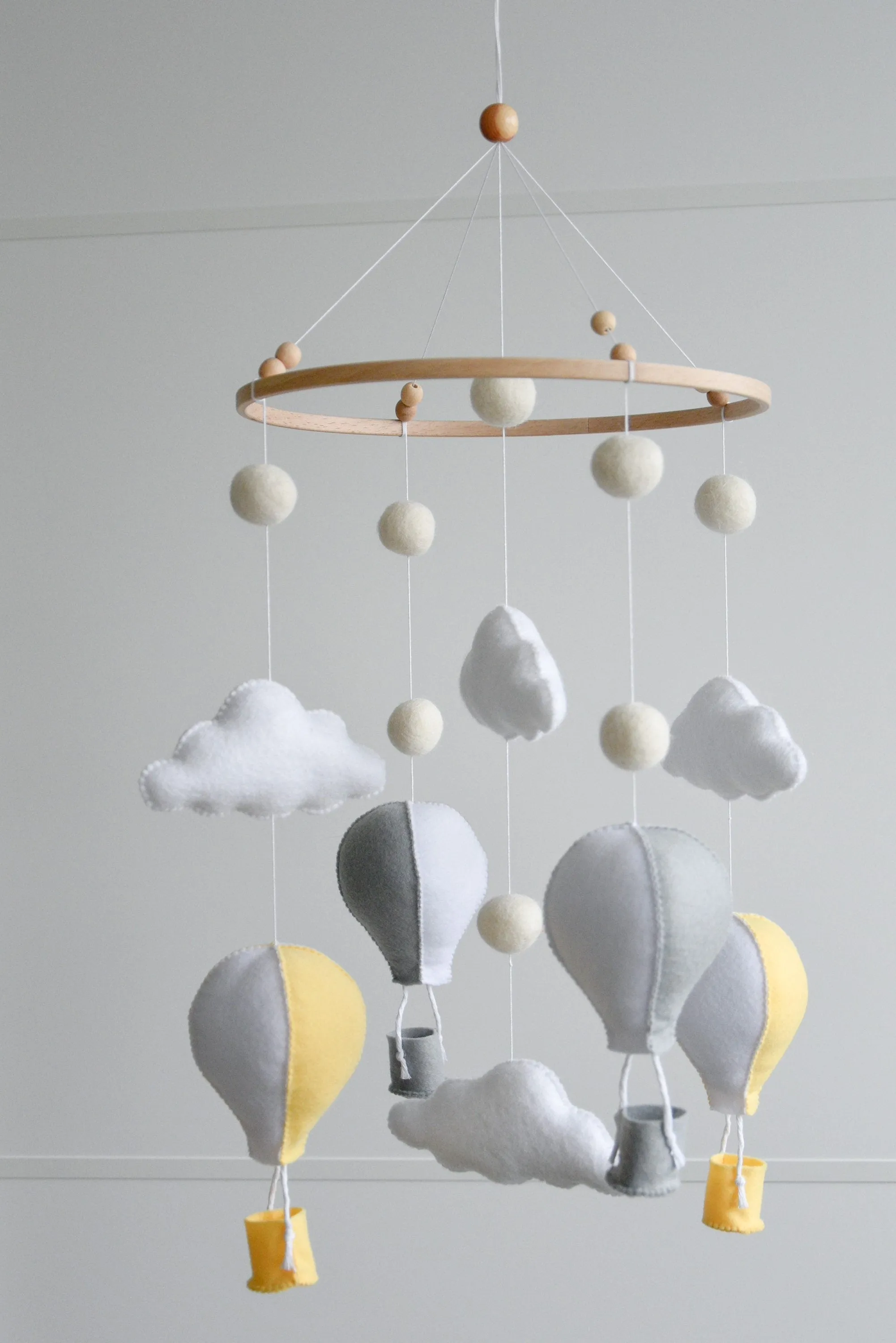 Hot air balloons mobile with felted balls and clouds