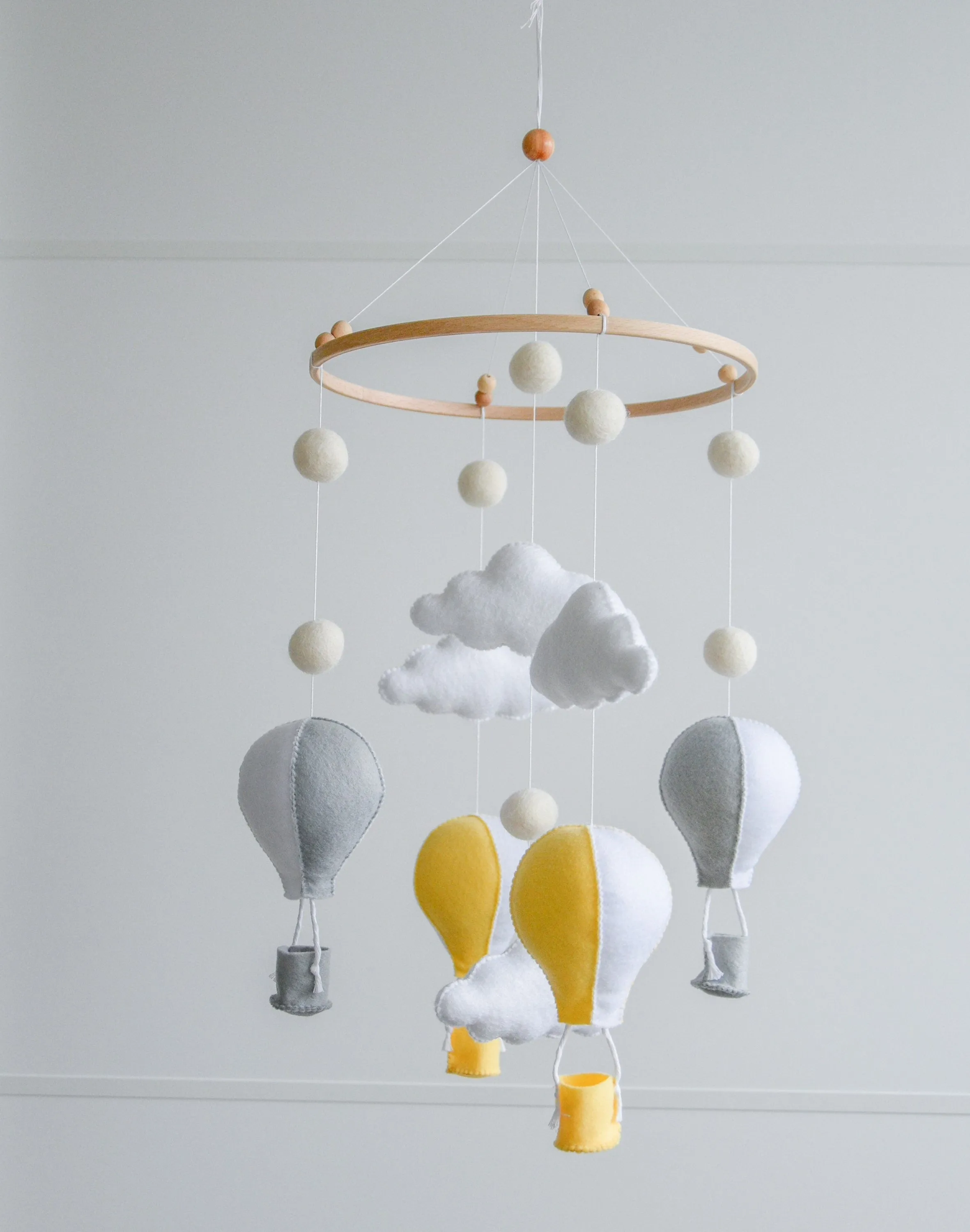 Hot air balloons mobile with felted balls and clouds