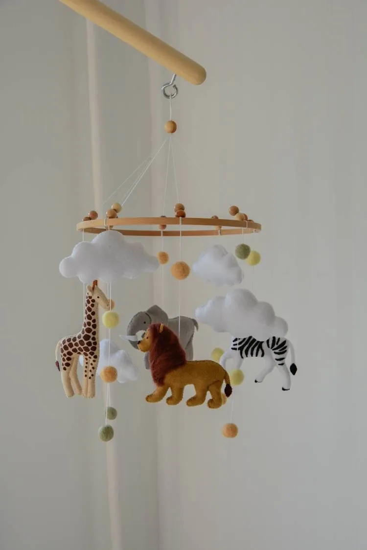 Safari mobile with felted balls cloud elephant giraffe zebra lion